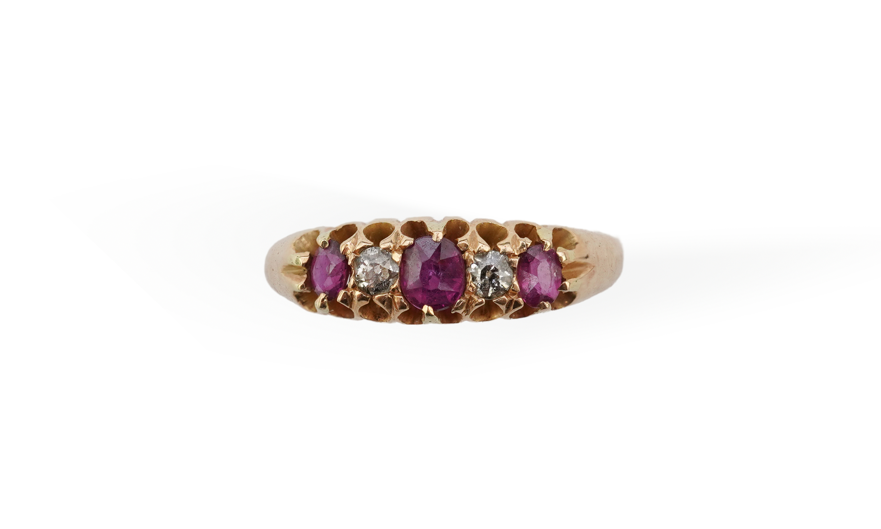 A ruby and diamond five-stone ring, circa 1900